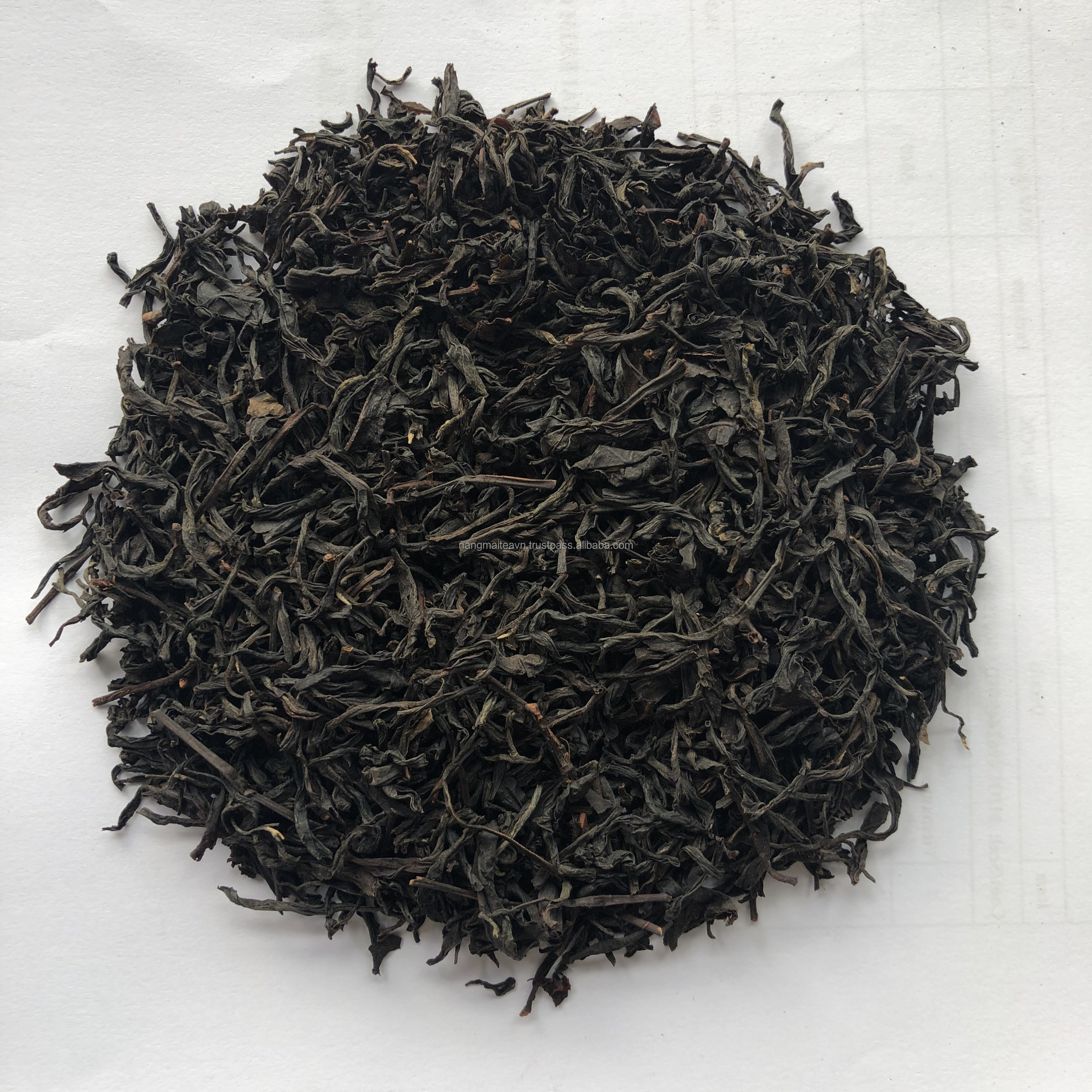 Hong Cha Black Tea OP OP1 Tightly Twisted  Brew a Dark Red colour cup of tea liquor