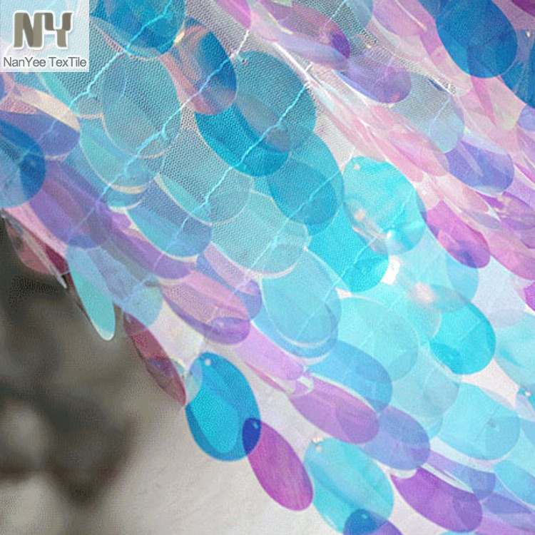 Nanyee Textile Melon Seed Shaped Pink Blue Color Changing Iridescent Sequin Fabric