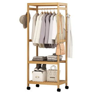 Portable roll clothes rack storage rack for shoes and clothes bamboo hangers