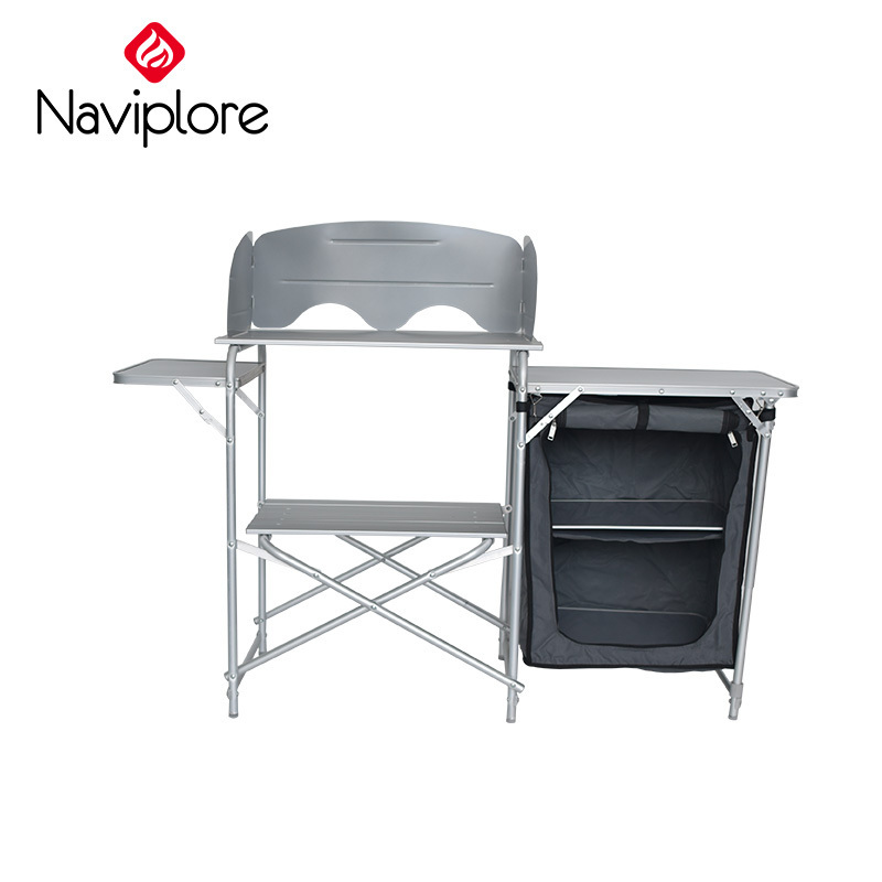 High quality Multi-function outdoor leisure folding camping picnic cupboard BBQ table foldable camp kitchen with windshield