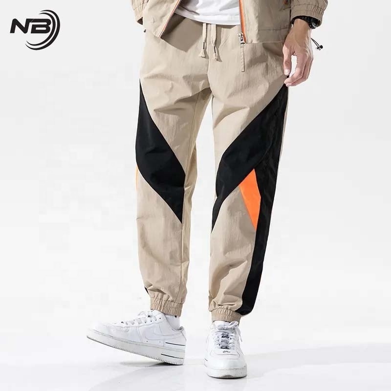 OEM Custom Logo Lightweight Windbreaker Parachute Tracksuit for Men High Quality Custom Design Zipper jogger set Tracksuit