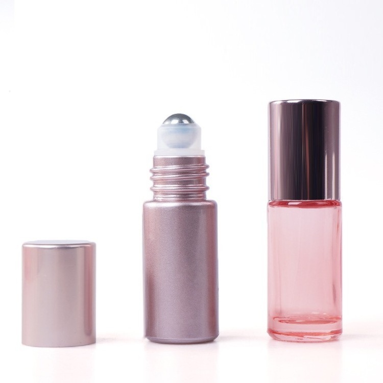 Wholesale empty 5 ml 10ml essential oil pink roll on perfume bottle with roller ball