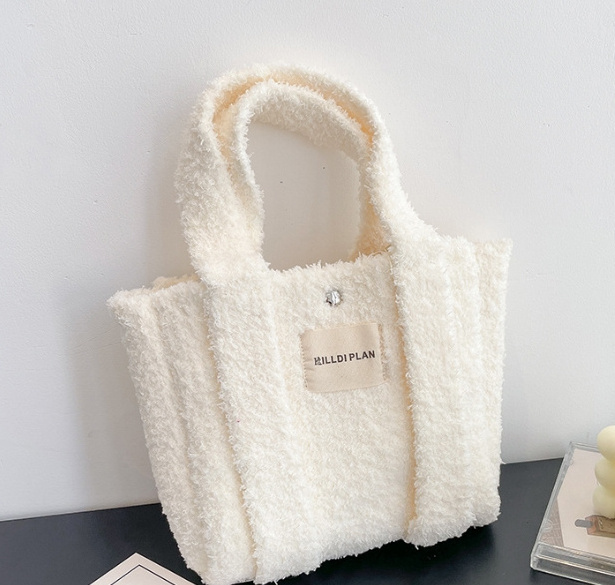 Candy color Autumn and winter fashion knit hand bag Solid color plush large capacity shoulder bag commuter fashion everything