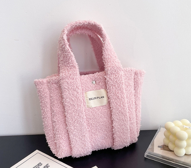 Candy color Autumn and winter fashion knit hand bag Solid color plush large capacity shoulder bag commuter fashion everything