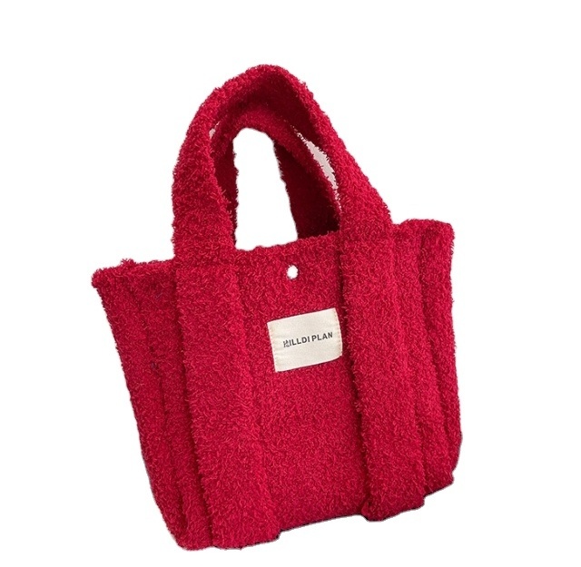 Candy color Autumn and winter fashion knit hand bag Solid color plush large capacity shoulder bag commuter fashion everything