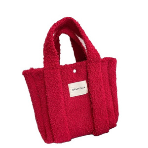 Candy color Autumn and winter fashion knit hand bag Solid color plush large capacity shoulder bag commuter fashion everything