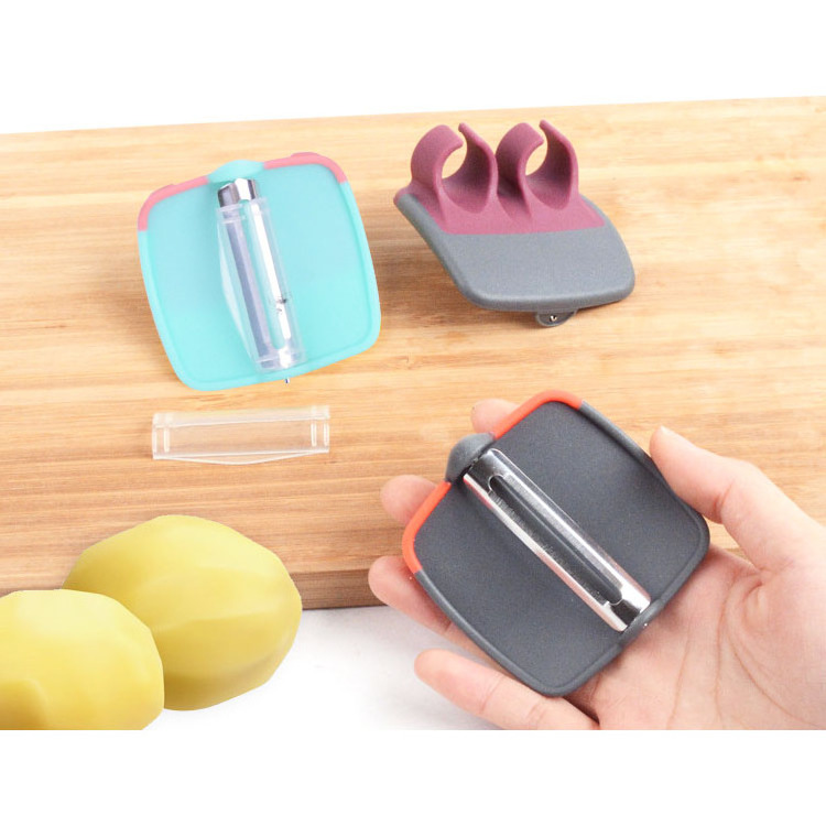 Wholesales Home Kitchen Gadgets Plastic Stainless Steel Two Fingers Apple Fruit Palm Peeler Potato Vegetables