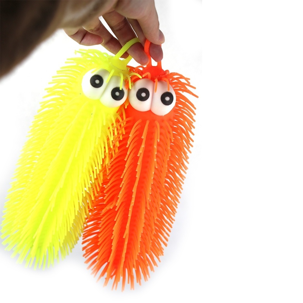 Hot selling squishy toy flashing fluffy caterpillar tpr light up puffer ball with yoyo