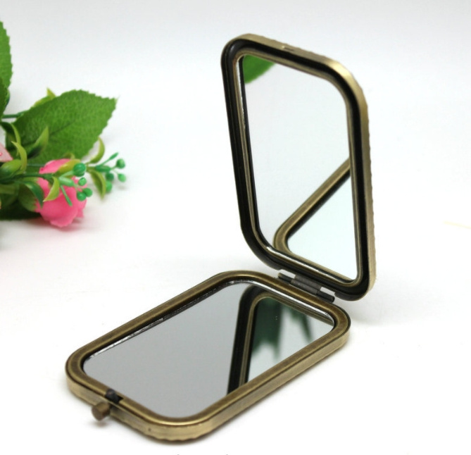 Retro art bronze rectangular double-sided makeup mirror hollowed out peacock portable beauty mirror