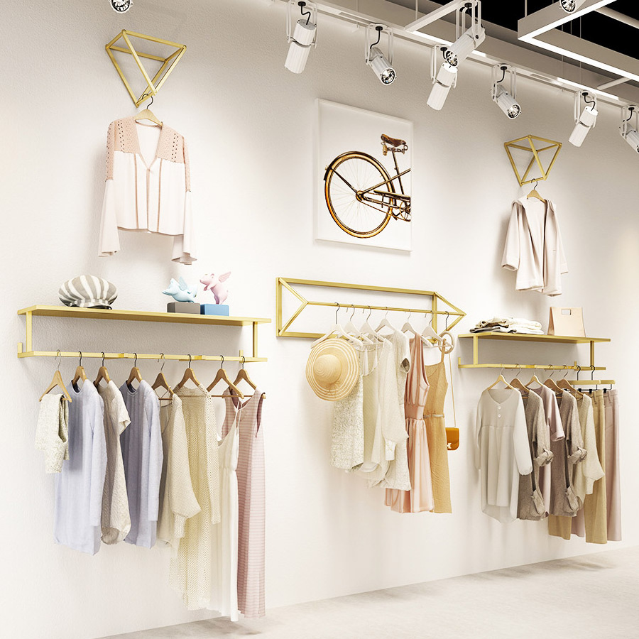 Custom Boutique Hanging Clothes Shelves Wall Mounted Stainless Steel Gold Wall Clothing Rack for Clothing Store