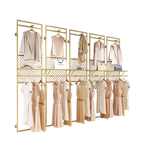 Custom Boutique Long Wall Shelves Clothing Stainless Steel Gold Wall Mounted Clothing Rack for Boutique