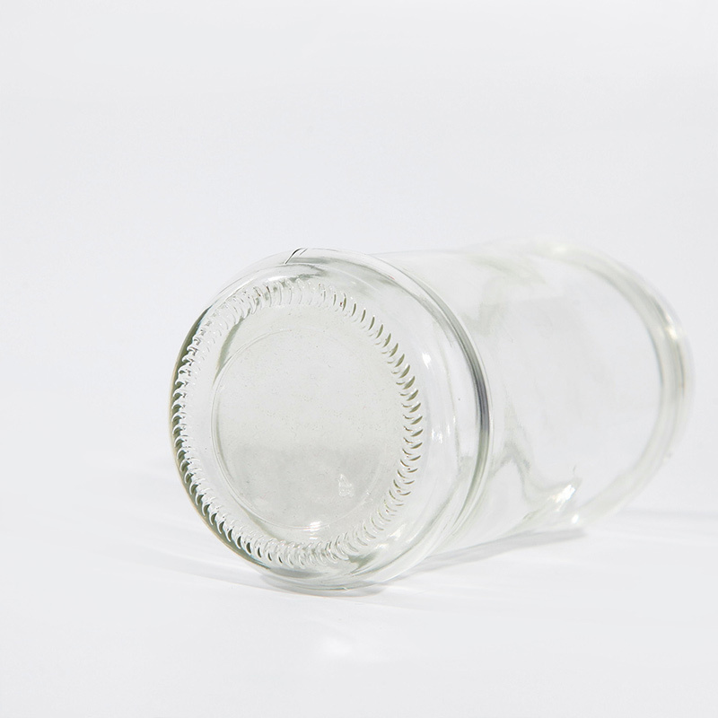 Wholesale Food Safety 750ml Round Empty Glass Food Jar for Peanut Butter Coconut Oil Pickles with 63mm Metal Lug Cap