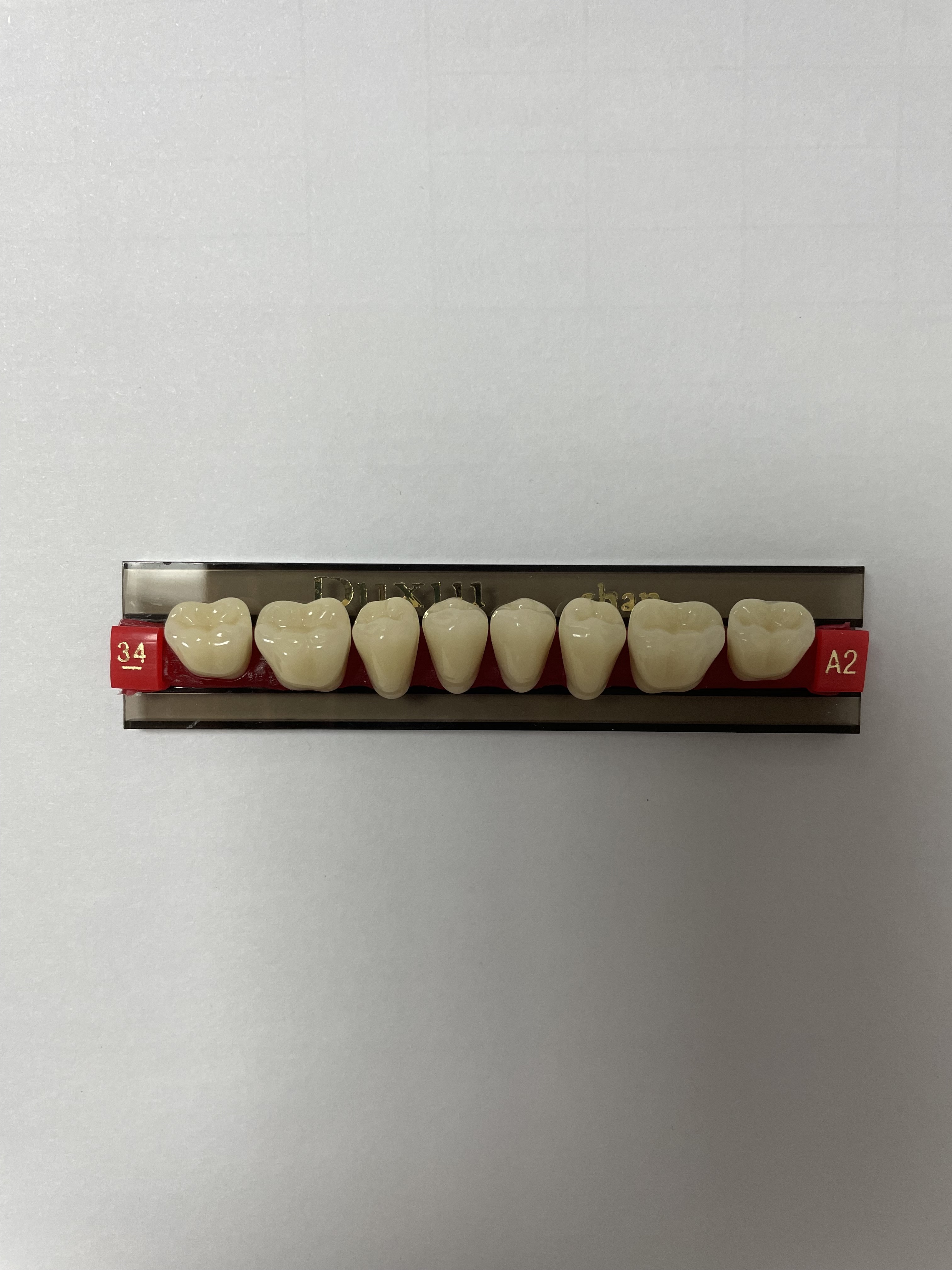 Wholesale Shanghai manufacturer supply high quality hard acrylic teeth for denture resin teeth dentures