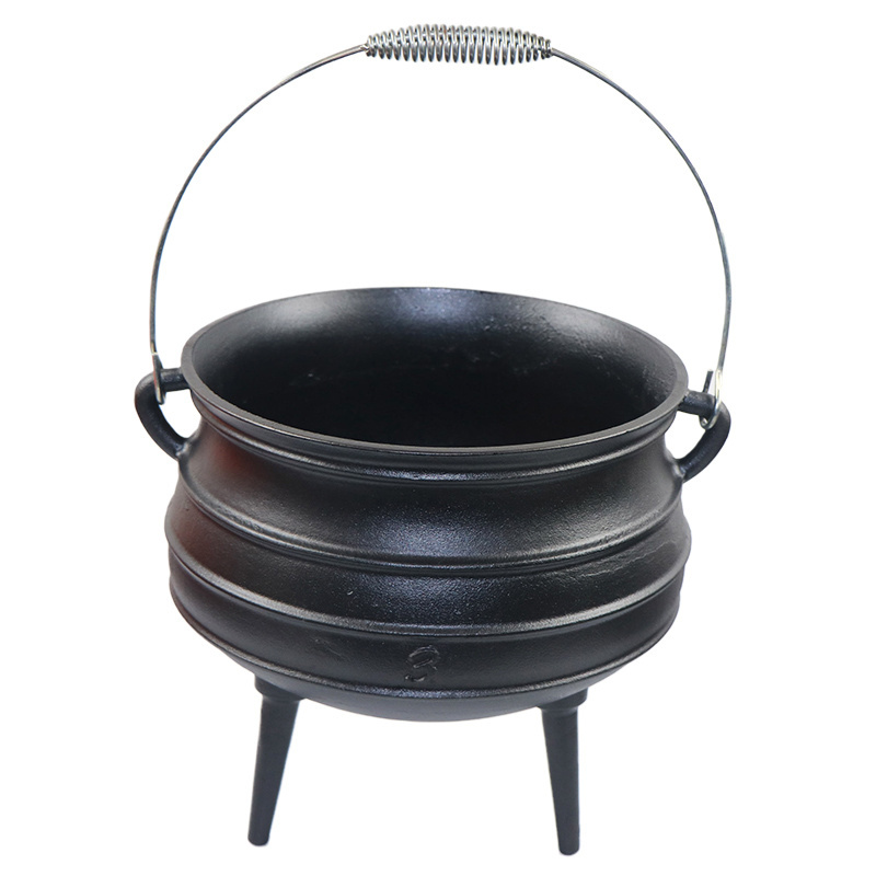 Heavy duty preseasoned cast iron kettle with a rounded bottom with three legs.