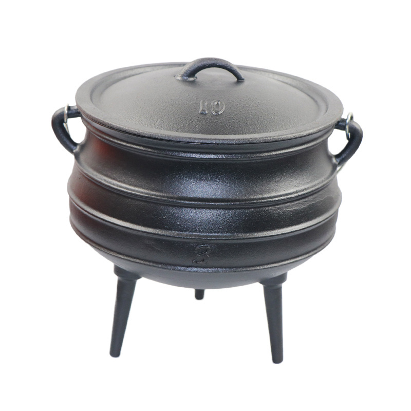 Heavy duty preseasoned cast iron kettle with a rounded bottom with three legs.