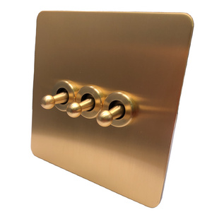 New design toggle wall switch UK standard Stainless Steel Face Panel electric switch brass light switches and socket