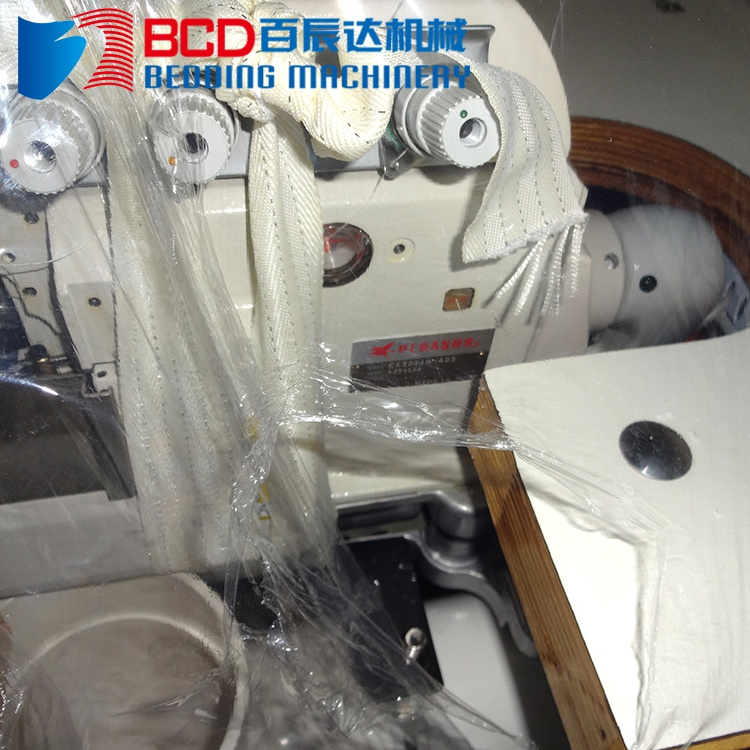 Long service life 4 thread mattress flanging overlocking automatic sewing machine with non-woven fabric stand