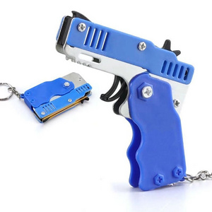 New children's hair folding rubber band toy gun simulation model gun key pendant children's band gun