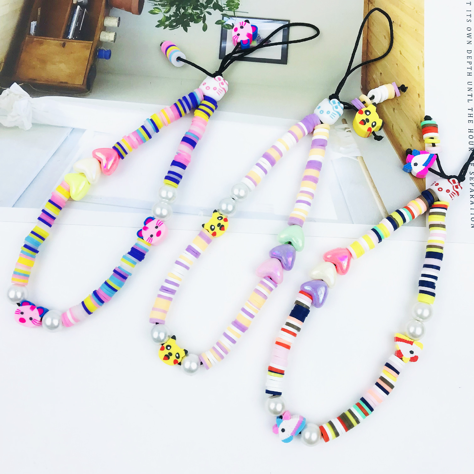 Factory spot European and American cross-border ins acrylic handmade DIY mobile phone lanyard pendant beaded mobile phone chain