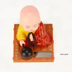 Shaking head car decoration small monk Buddha statue creative doll home solar small monk car decoration blue red yellow