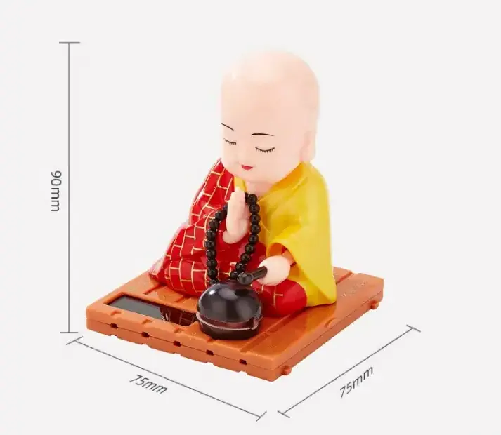 Shaking head car decoration small monk Buddha statue creative doll home solar small monk car decoration blue red yellow