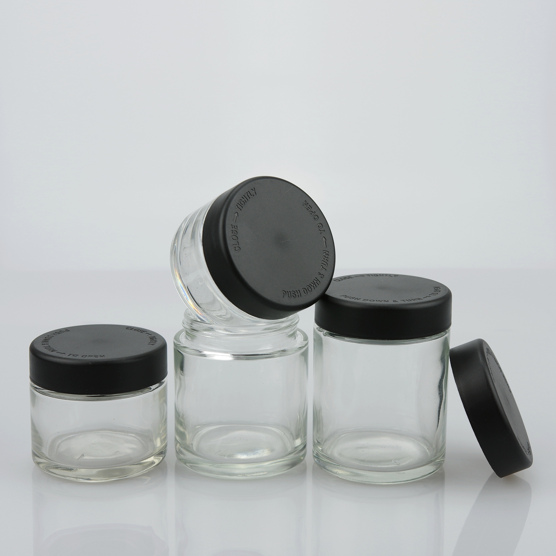 High Quality 1 oz 2 oz 3 oz 4 oz glass jar with child proof cap for packaging and glass dropper bottles