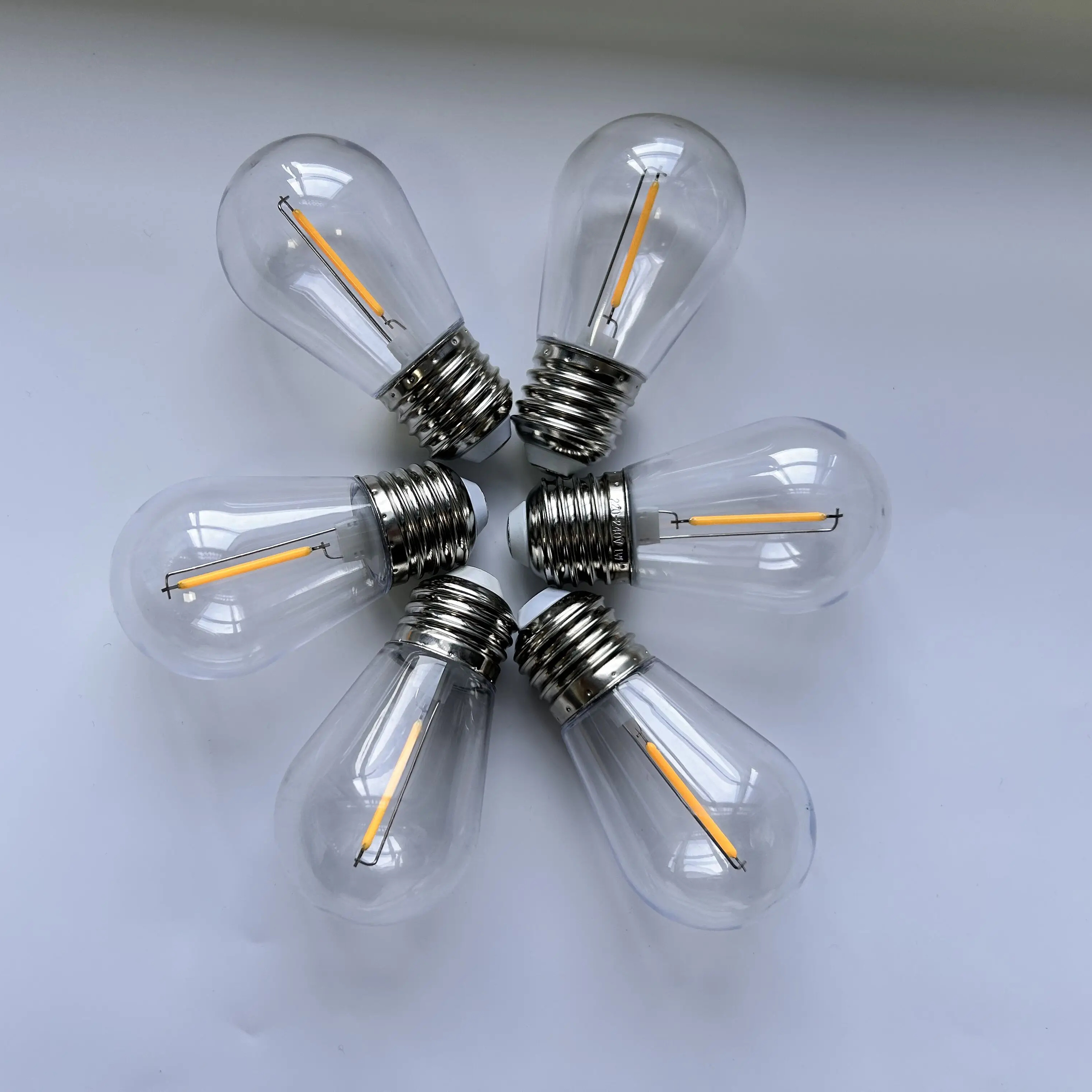 Wholesale In Stocks ready to ship 220V 120V Warm White 2700K E27 Sockets S14 1W Clear plastic Globe LED Filament Bulb