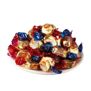 Chinese confectionery factory produces festive chocolate filled puffed toffee with Russian flavor