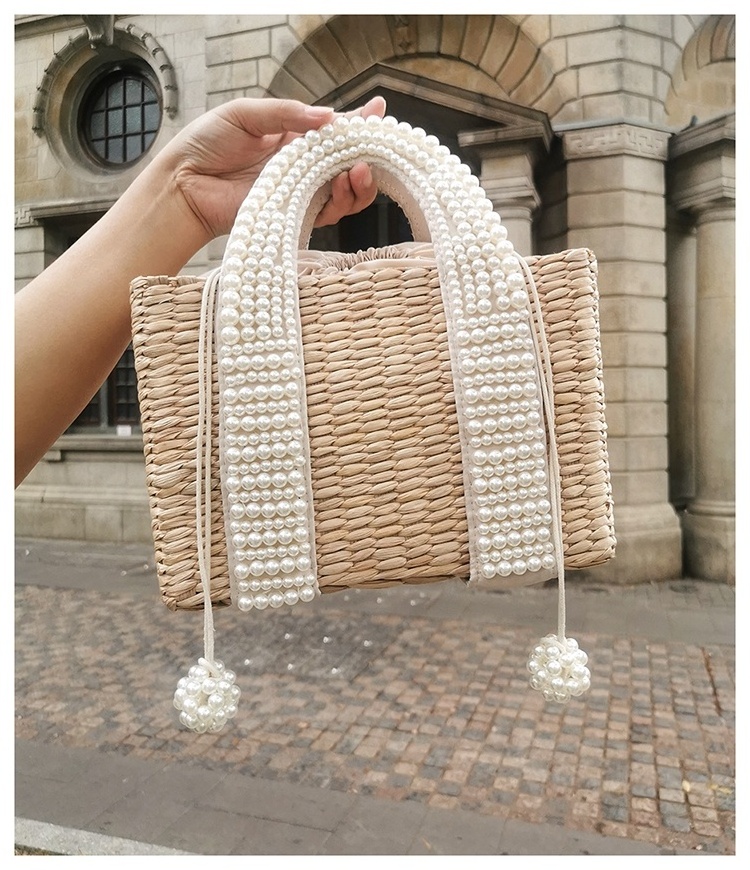 Fashion design lady small handmade straw bag with pearl handle summer tote bag travel shopping handbag corn husk straw bags