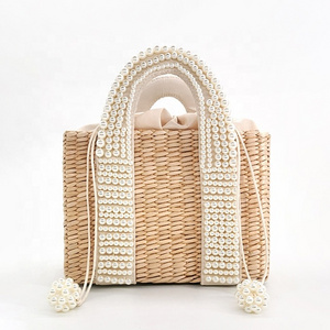 Fashion design lady small handmade straw bag with pearl handle summer tote bag travel shopping handbag corn husk straw bags