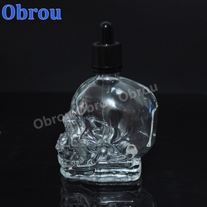 Wholesale 30ml perfume bottle essential oil glass skull bottle with child proof dropper