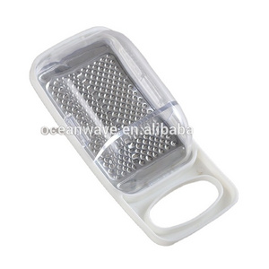 Stainless steel cheese grater with container