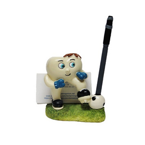 custom resin pencil holder Handsome tooth shaped boy sitting desktop pen holder