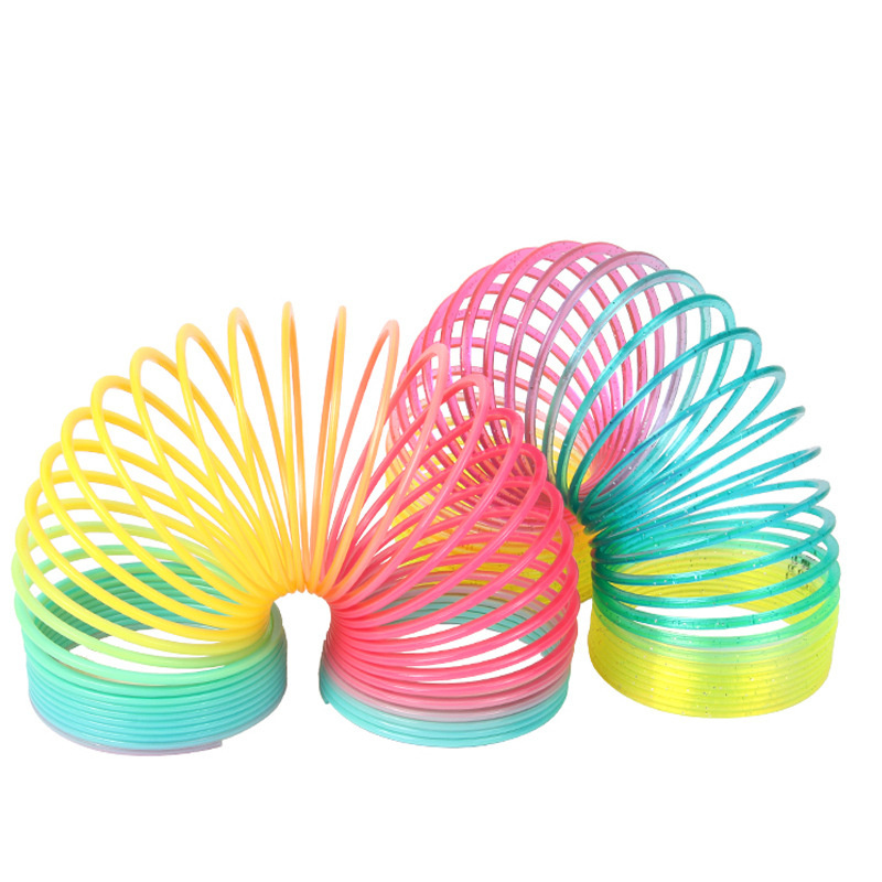 Wholesales 1 piece of rainbow circle fun early education folding plastic spring coil toy 8.7*9cm