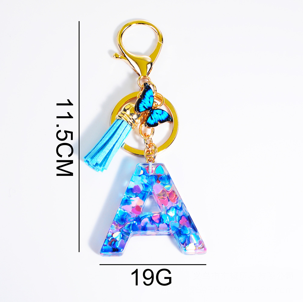 Wholesale blue butterfly fashion mini cute metal tassels resin key chain custom letter initial acrylic plastic keychain