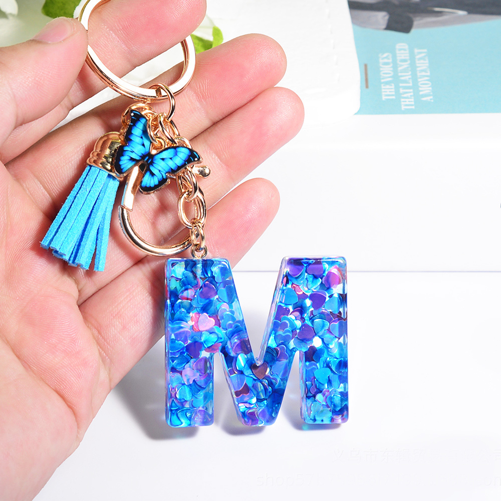 Wholesale blue butterfly fashion mini cute metal tassels resin key chain custom letter initial acrylic plastic keychain