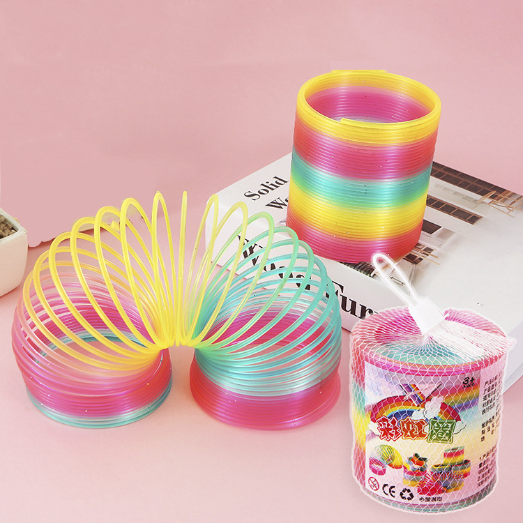 Hot Selling Kids Great Party Favors Supply Gift Mini Smiley Face Print Colorful Magic Rainbow Coil Spring Antistress Toy Gift