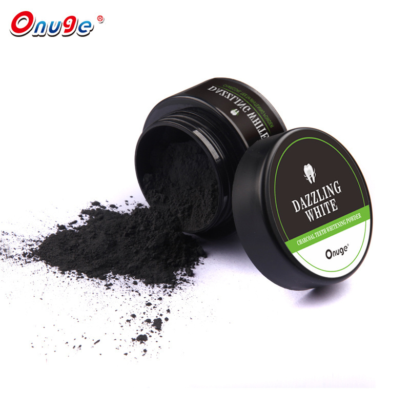 tooth paste tube toothpaste and coconut oil added charcoal teeth powder