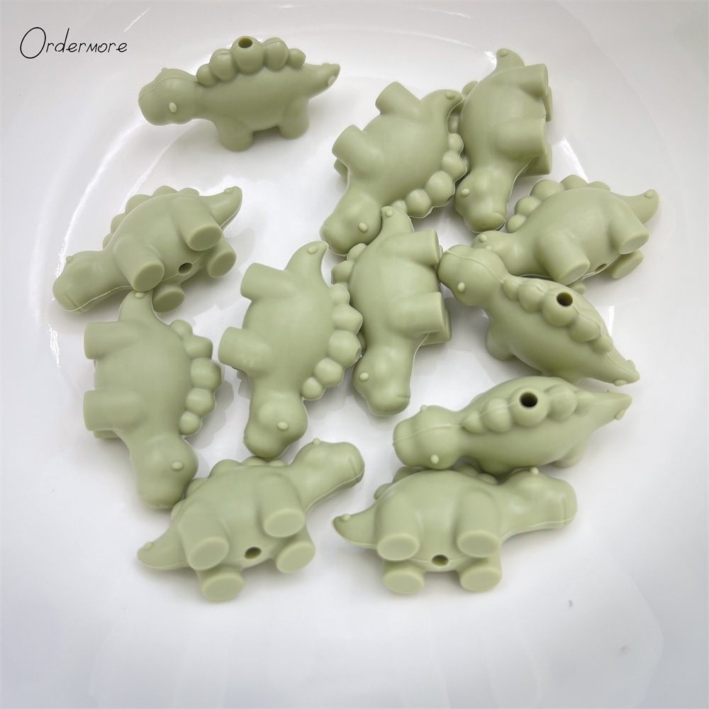 Ordermore BD72 bpa free custom wholesale 3d animal focal silicone dragon dinosaur beads for baby teething