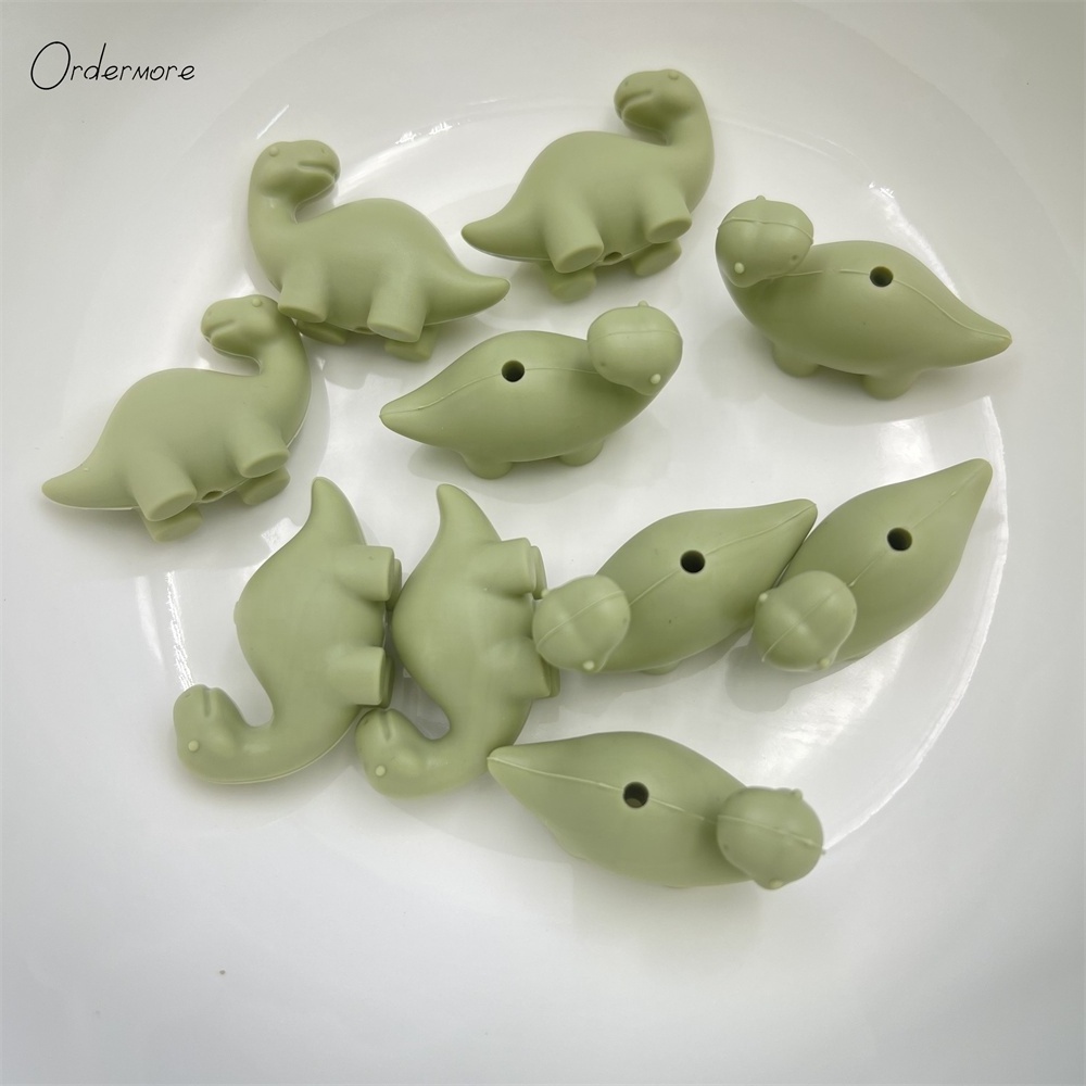 Ordermore BD72 bpa free custom wholesale 3d animal focal silicone dragon dinosaur beads for baby teething