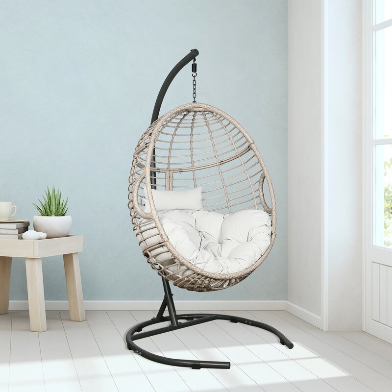 Cheap price indoor outdoor modern hanging bamboo patio rattan wicker egg swing clear chair with Waterproof cloth cushion