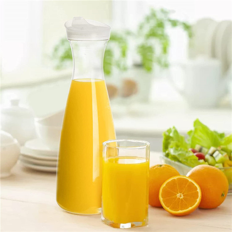 Latest arrival Plastic Beverage Pitcher Carafe With Narrow Neck Design With Plastic Lids Plastic Carafe Water Pitcher