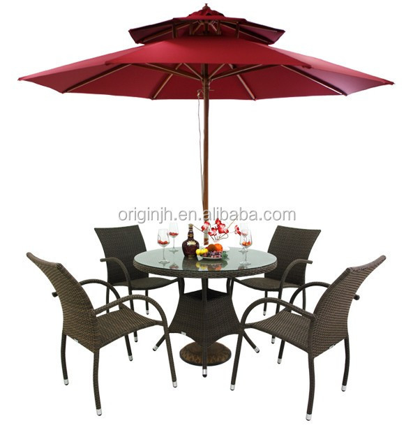 Umbrella hole designed restaurant rattan chairs and round dining table set patio furniture outdoor modern