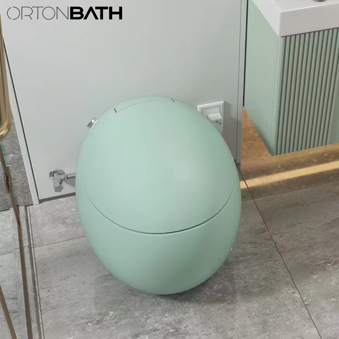 ORTONBATH Oval Round Ceramic Egg Shape One Piece Ceramic Toilette Bowl One Piece Toilet Glossy White Smart Automatic Intelligent