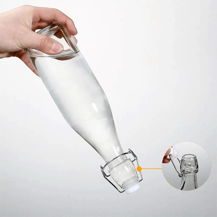 OSHOW Wholesale Beverage Packaging Water Milk Use Glass Beer Bottle With Swing Top