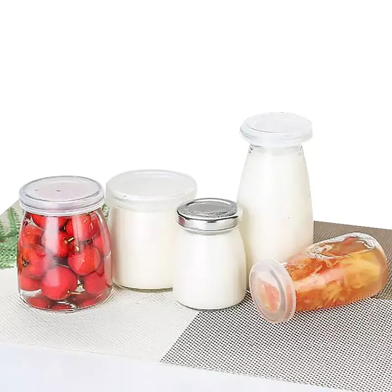 Oshow Wholesale milk drink container pot 50ml 75ml 100ml 150ml 200ml glass pudding jar With plastic metal lid