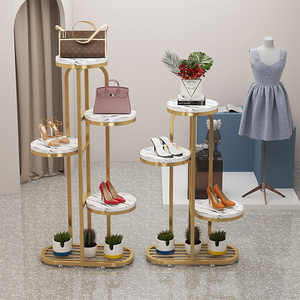 display shelf floor-to-ceiling window display table Golden iron shoes store bag decoration storage rack flow table