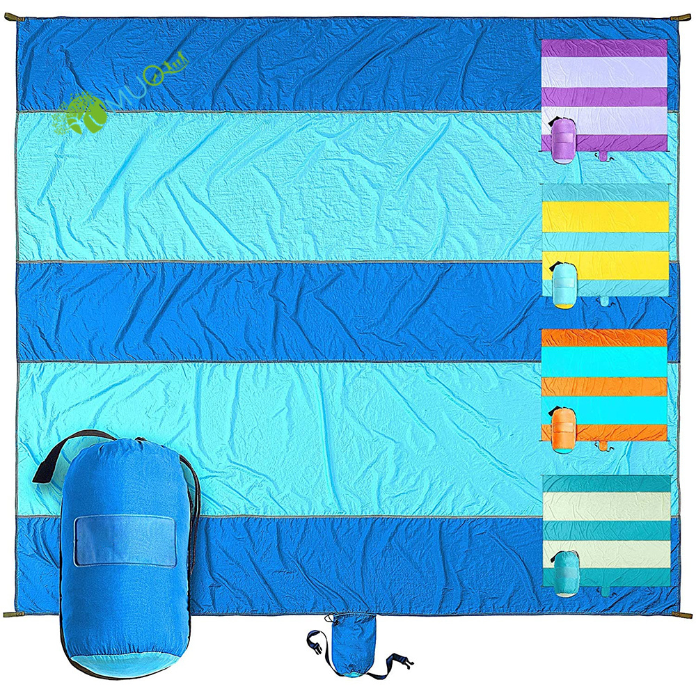 YumuQ Beach Blanket Sand proof Oversized 10ft by 9ft for 2-8 Adults Beach Mat Accessories with 4 Stakes and 4 Corner Pockets