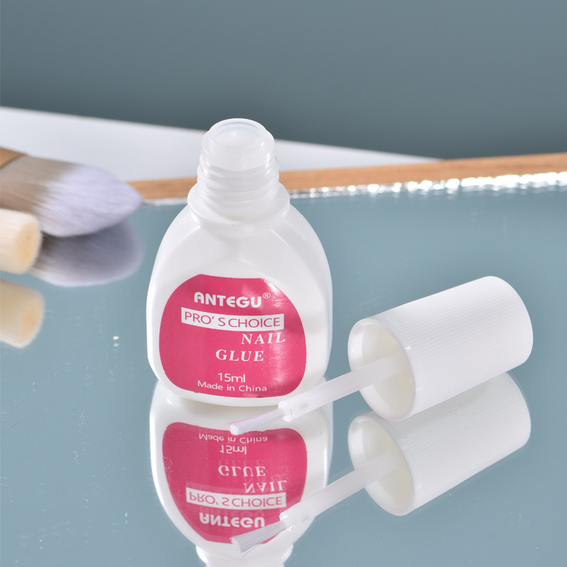 Wholesale 15ML custom pink manicure glue with brush on finger nail glue for nail salon