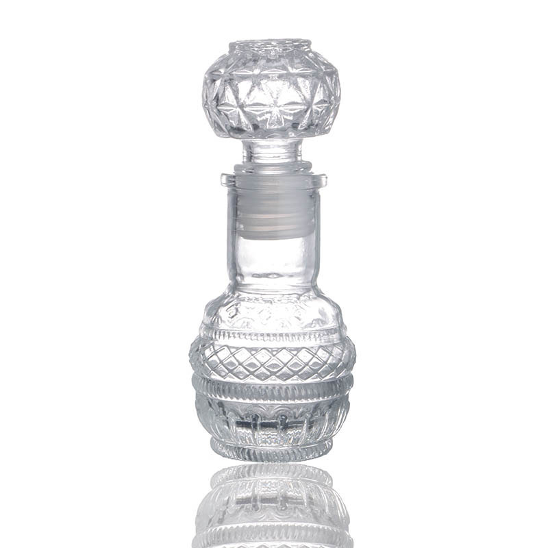 Customize Luxury Mini Liquor Bottle 50ml 100ml Embossed Glass Wine Container With Airtight Stopper Small Decanter